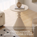 A small iron round table on the balcony