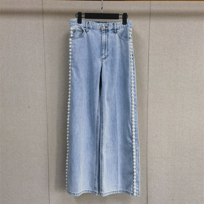 A light blue denim shirt and wide-leg pants suit