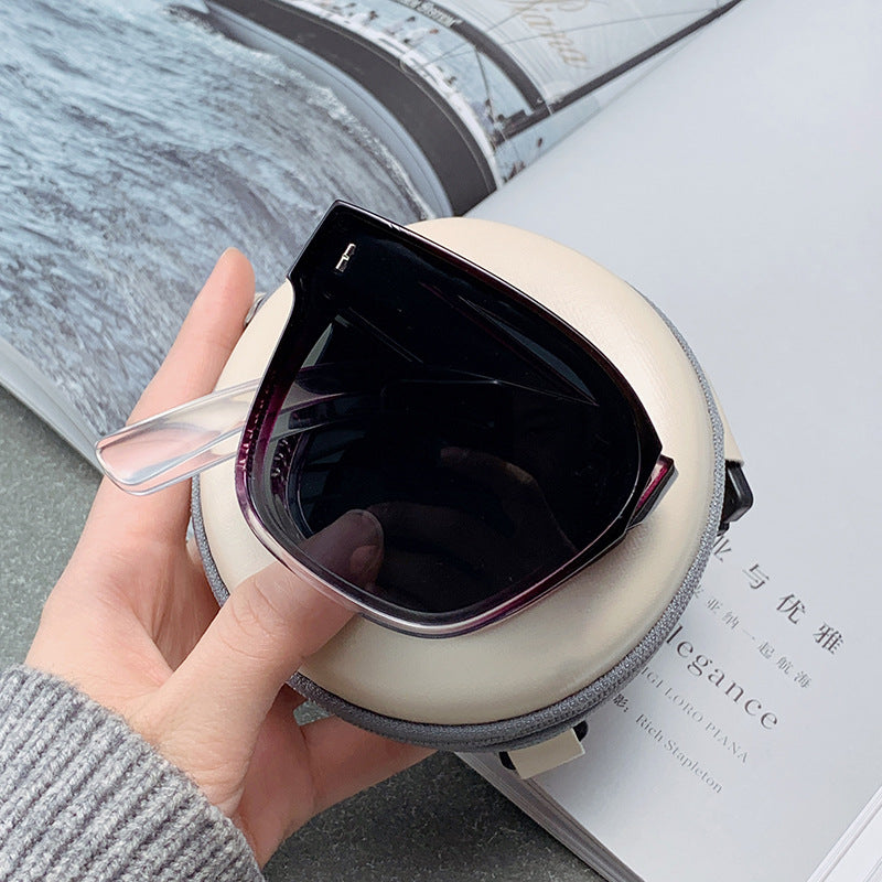 Folding sunglasses can be worn over men's myopia glasses