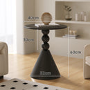 A small iron round table on the balcony