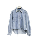 A light blue denim shirt and wide-leg pants suit