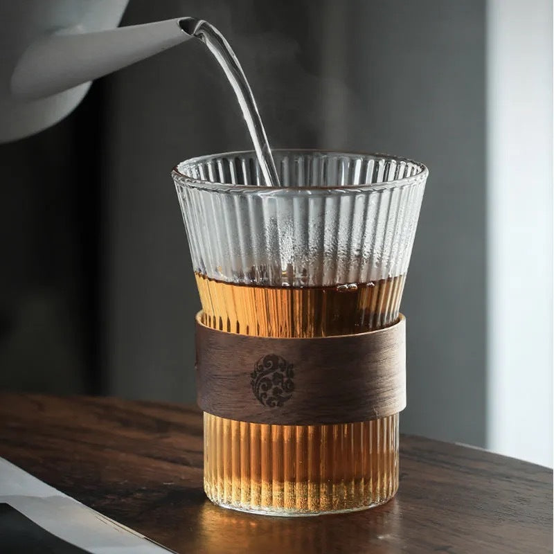 A high borosilicate teapot for brewing tea around a stove