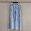 A light blue denim shirt and wide-leg pants suit