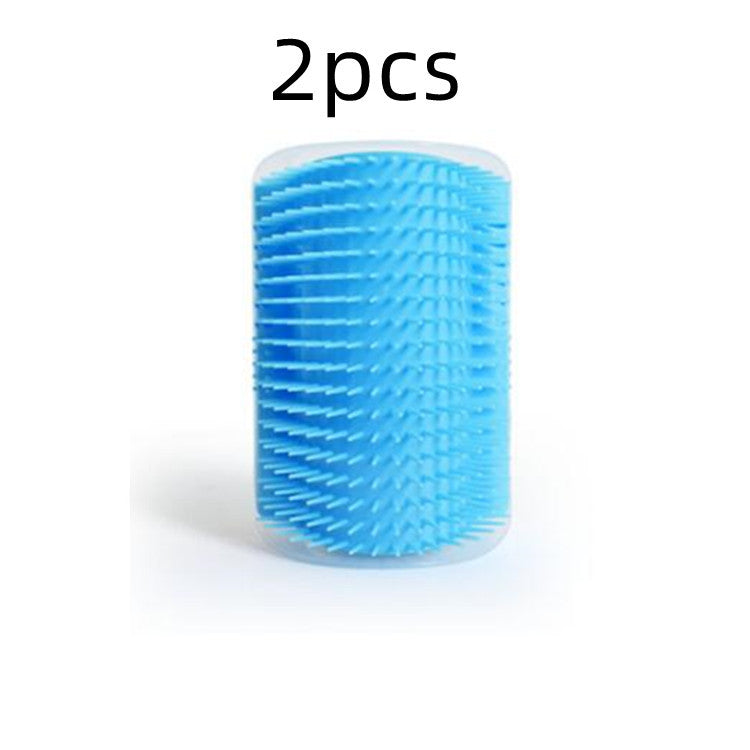 القطة تفرك وجهها بزاوية الحائط ودغدغ مشط تدليك شعر الحيوانات الأليفة مشط إبرة مع عشبة النعناع البري