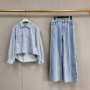 A light blue denim shirt and wide-leg pants suit