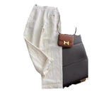 طقم مكون من قطعتين من القطن والكتان بتصميم عصري، مع سترة وبنطلون واسع الساق