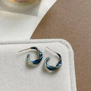 2023 New Fashion Lavender Purple Earrings for Woman Metal Golden Twisted Art Line Purple Stud Earrings Gift Jewelry Wholesale