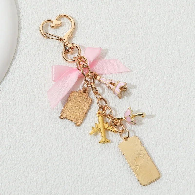 Pink Ticket Luggage Plane Eiffel Tower in Paris Enamel Keychain Love Romantic Key Ring For Women Girls Travel Enthusiasts Gift
