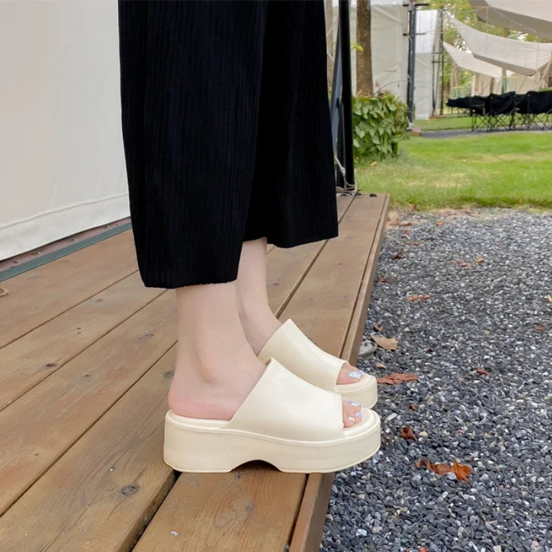 Summer Slope Heel Thick Sole Women's Slippers 2023 New Simple Soft Sole EVA High Heel Slippers Wearing Beach Anti Slip Slippers