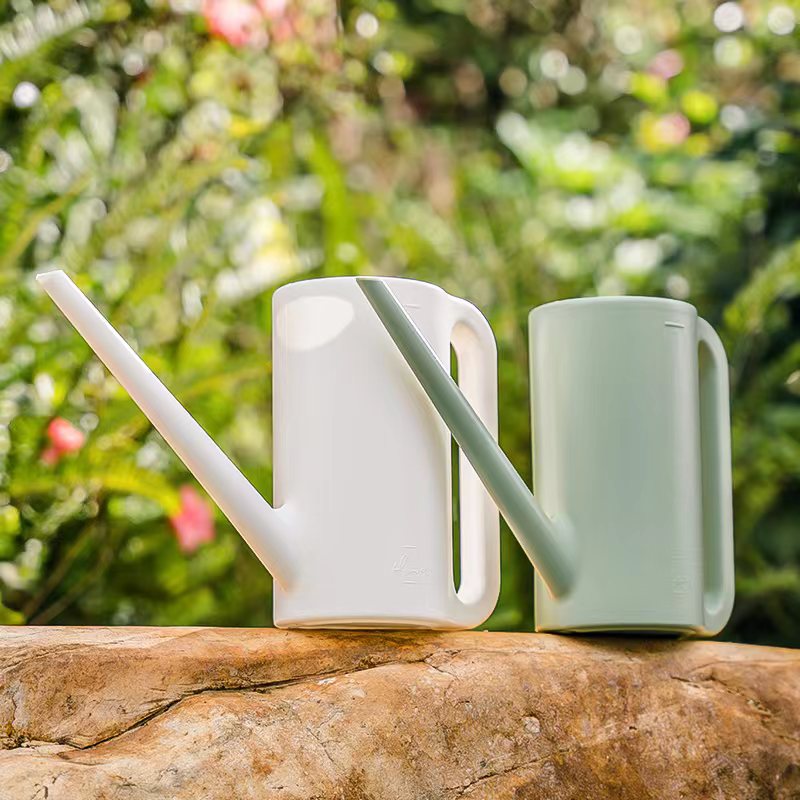 Plastic watering can