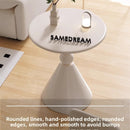 A small iron round table on the balcony