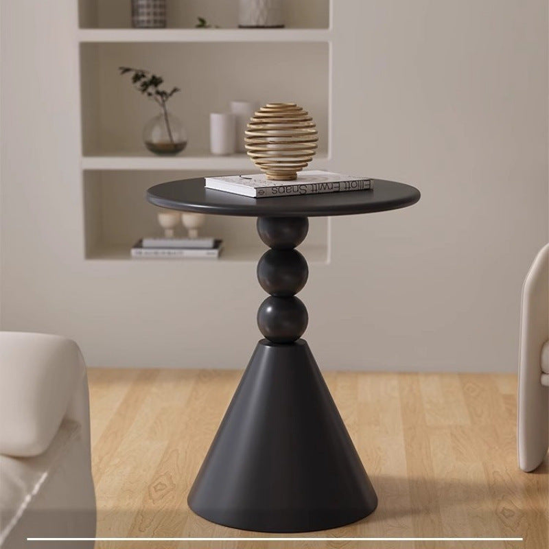 A small iron round table on the balcony