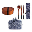 Oval-shaped coffee-colored wooden bento box