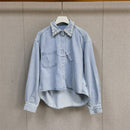 A light blue denim shirt and wide-leg pants suit