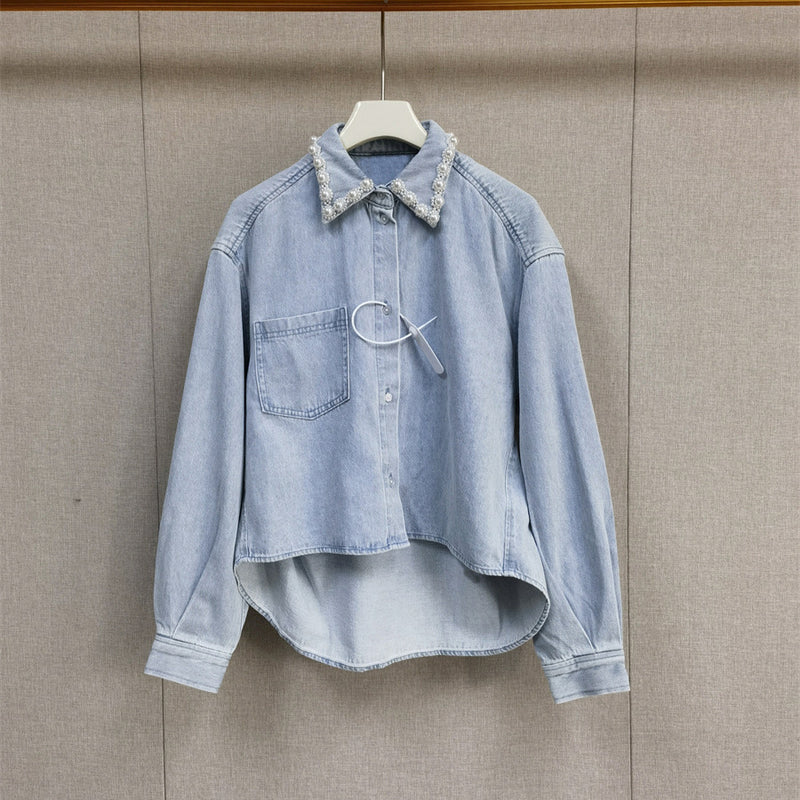 A light blue denim shirt and wide-leg pants suit