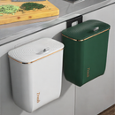 Wall-mounted trash can in the bathroom