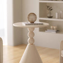 A small iron round table on the balcony