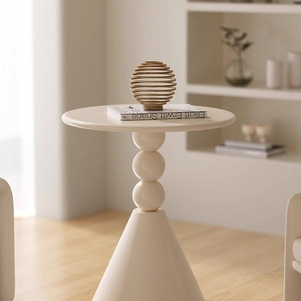 A small iron round table on the balcony